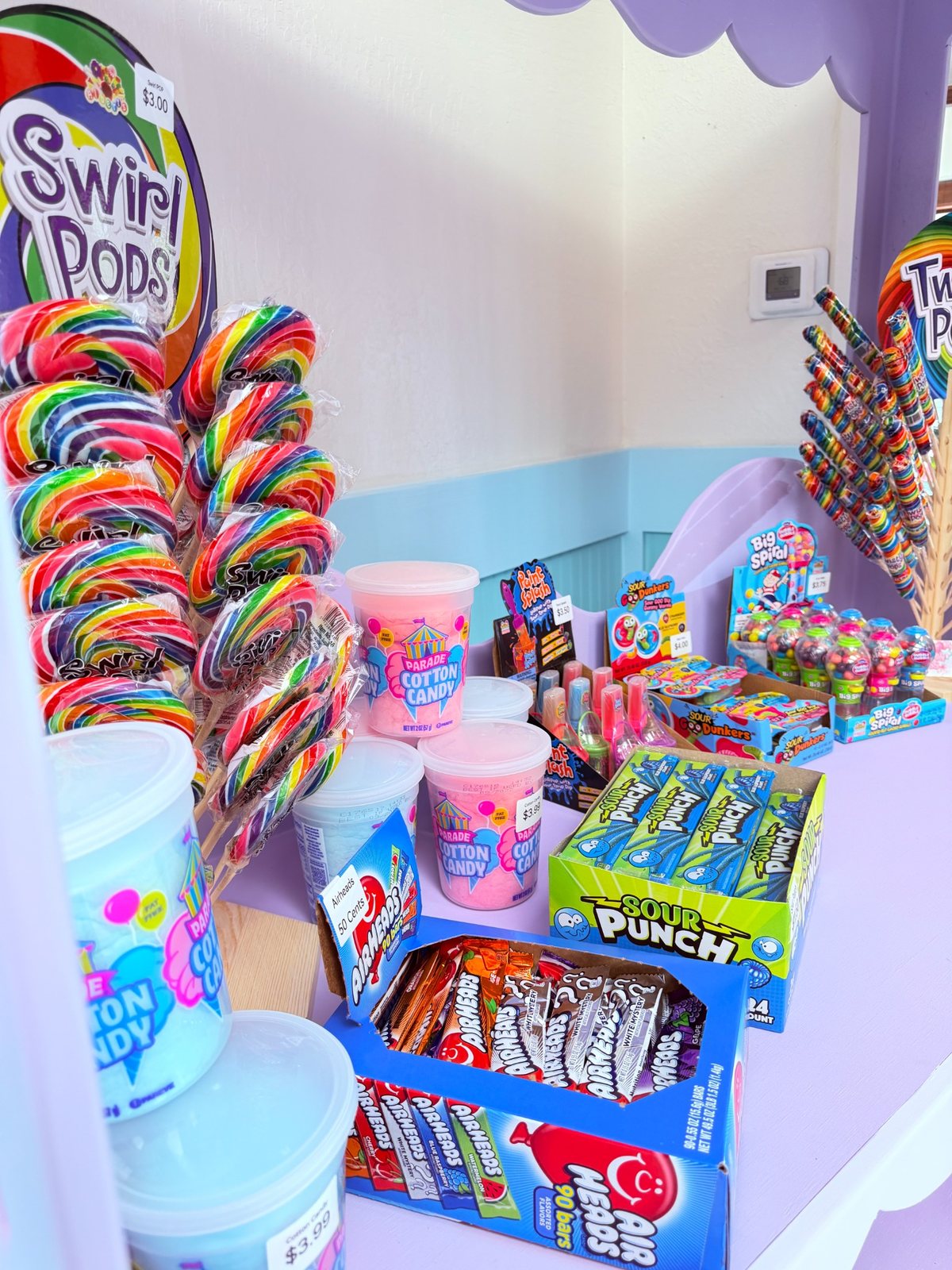 Candy, cotton candy, lollipops, and sweet treats