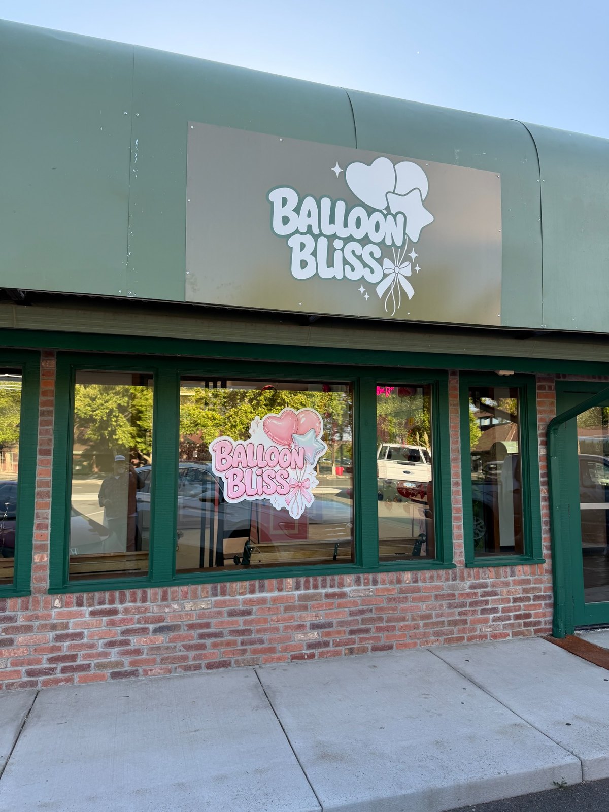 Balloon Bliss storefront sign and windows