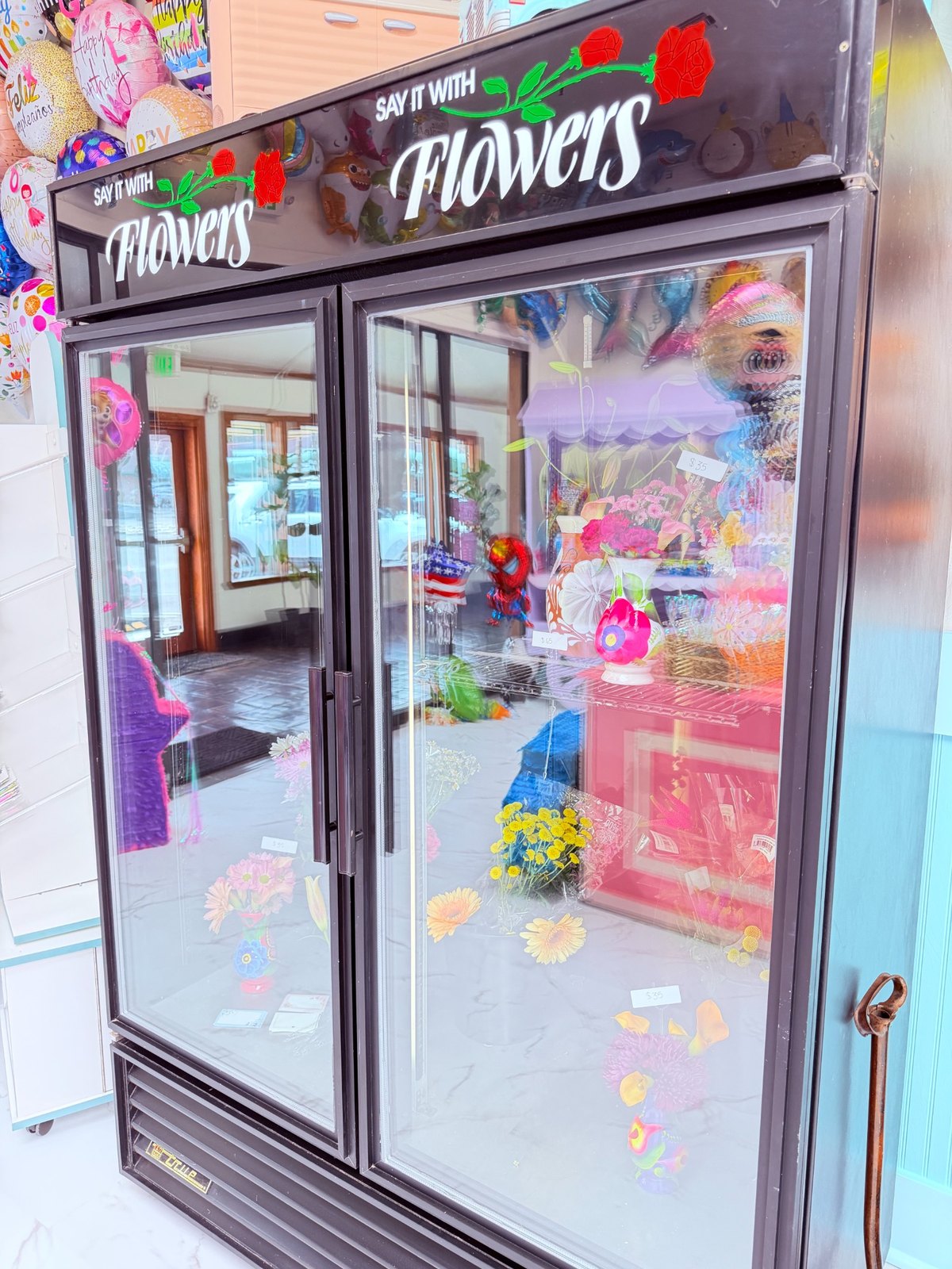 Fresh flower cooler inside Balloon Bliss