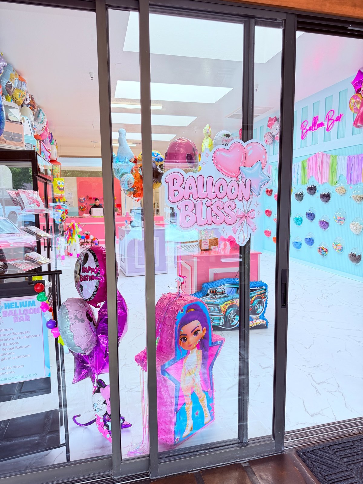 Front window close-up with Balloon Bliss logo