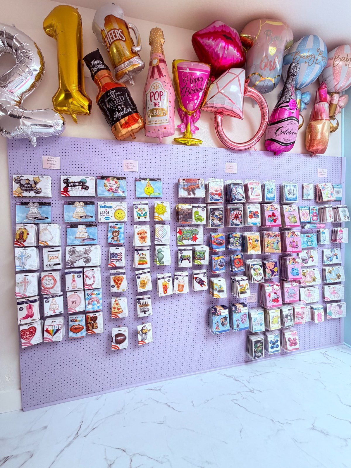 Greeting cards and occasion balloons wall
